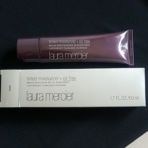 Like new. Laura Mercier tinted moisturizer.